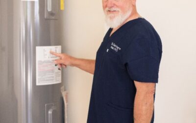Moving a Water Heater From the Garage to the Attic: Drain Pans, Access, and Code Requirements